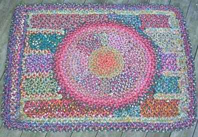 folk art braided rug from our folk art catalogue